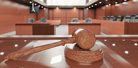 View of courtroom with close up on gavel