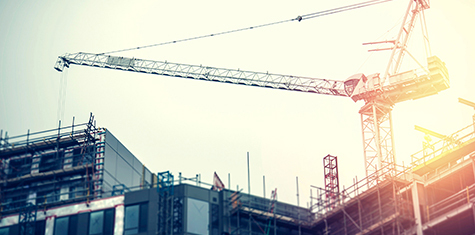 Construction crane working on a skyscraper