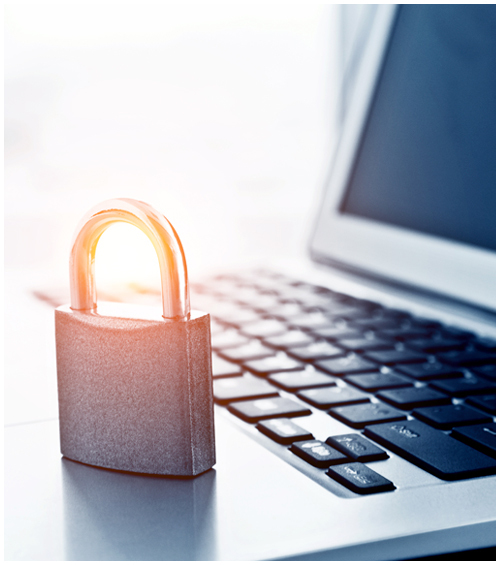 Padlock on top of a laptop computer